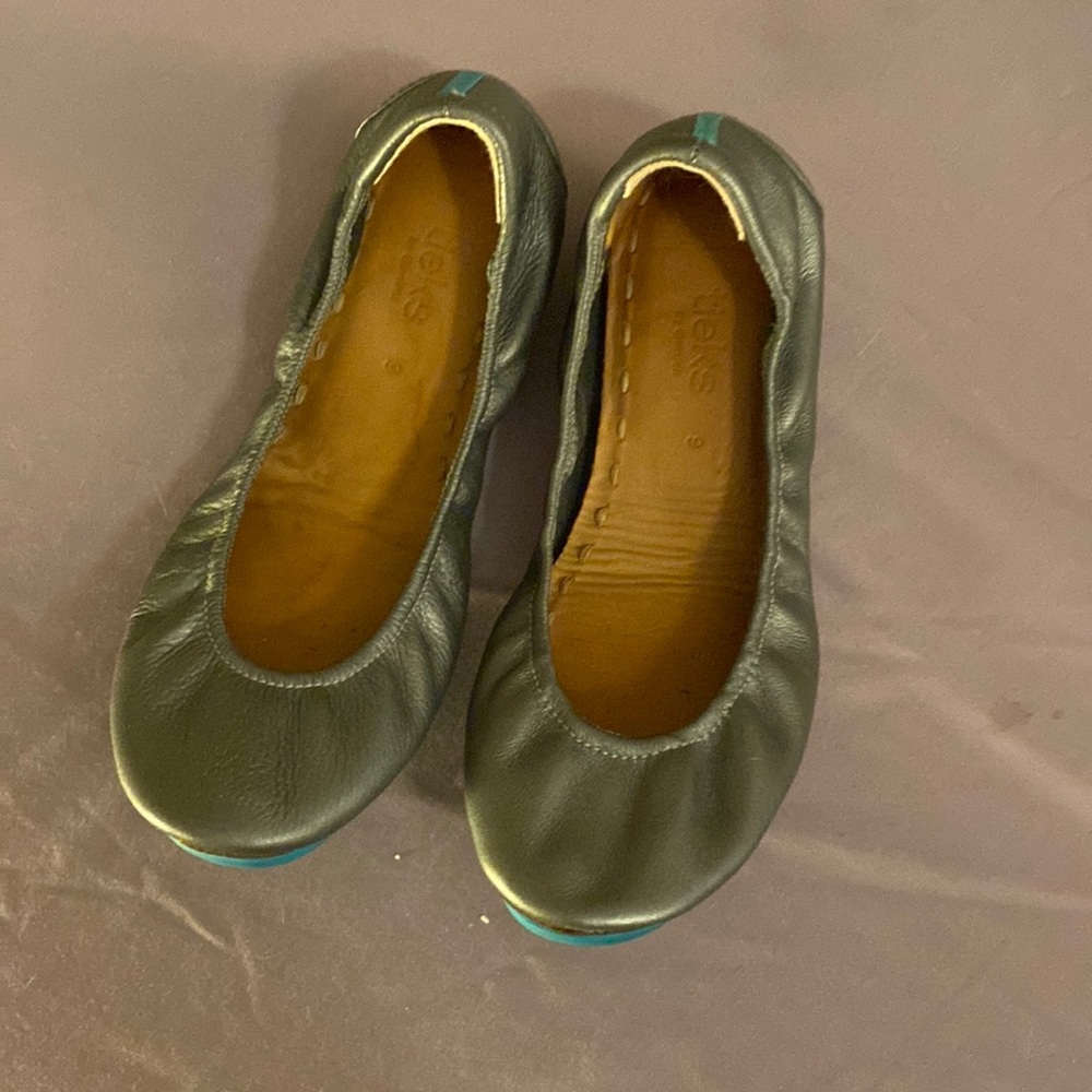 Silver tieks size 9